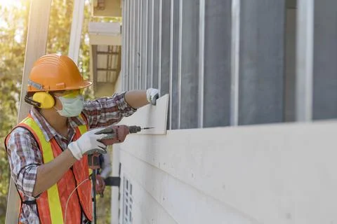 Craftsman, Plumber, Construction Worker With Panel,Construction worker during Stock Photos