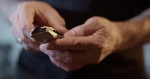Craftsman preparing cutter for leather Stock Footage 172488661
