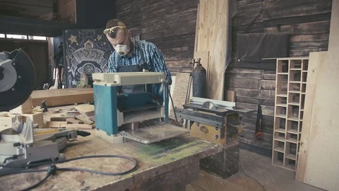 Craftsman with saved glasses work at his workstation Video stock 72727867
