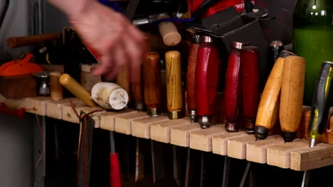 Craftsman Selects the Right-Sized Chisel for Woodworking Stock Footage 306012001