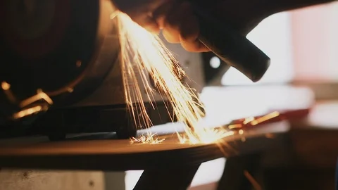 Craftsman sharpening tool in the workshop Stock Footage 89303925