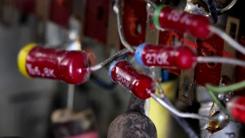 Craftsman Soldering a Component of an Old-Model Microchip Stock Footage 306012021