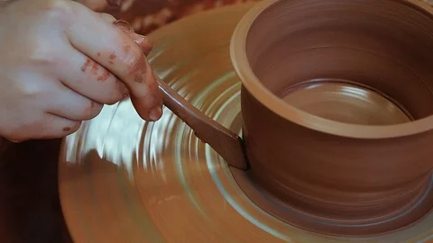 The craftsman teaches the child to make a ceramic Cup Video stock 97873482
