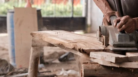 Craftsman use polishing machine to make splat is smooth split wood pieces Stock-Footage 117933238