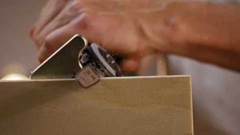 Craftsman using a jigsaw Stock Footage 100814140