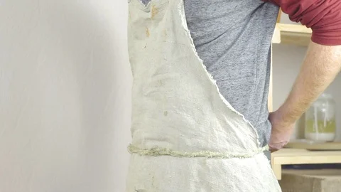 Craftsman wears apron Stock Footage 96285559
