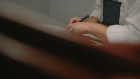 Craftsman work with big peace of leather, slow motion, midle shot Video stock 101583624