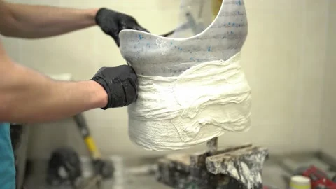 Craftsman worker manufacturing artificial limb in factory Stock Footage 236622222