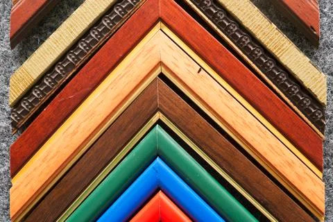 Craftsman working on frame in frameshop. Stock Photos