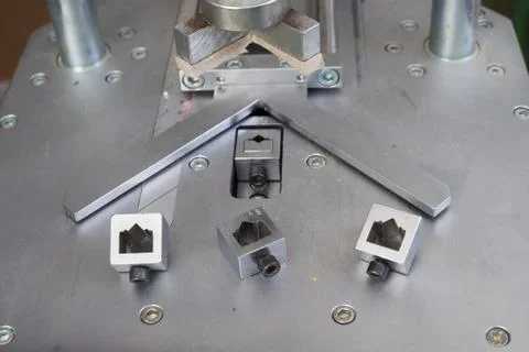 Craftsman working on frame in frameshop. Stock Photos