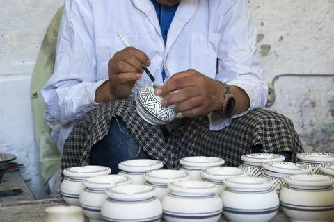 Craftsman working his materials Stock Photos