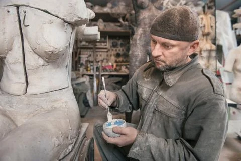 Craftsman working in his workshop Stock Photos
