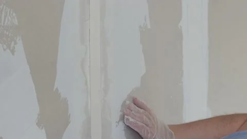 Craftsman working with plaster gypsum ceiling for interior build gypsum board. Stock Footage 147514497