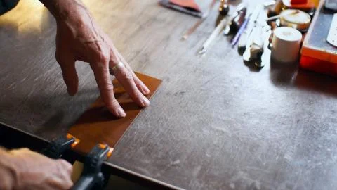 Craftsman working in workshop. Stock Photos