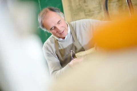 Craftsman in workshop Stock Photos