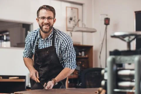 Craftsmanship with a smile Stock Photos