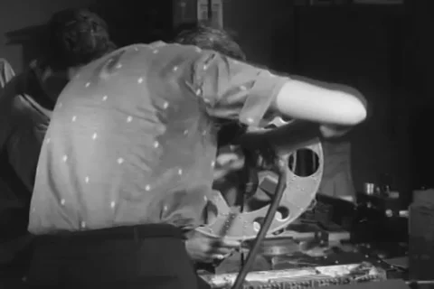 Craftsmen assemble bio-pack frame for response conditioning tests - 1959 Stock Footage 104652177