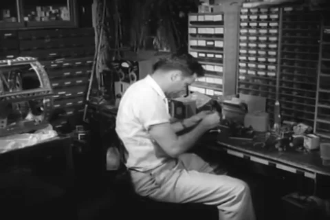 Craftsmen assemble bio-pack frame for response conditioning tests - 1959 Stock Footage 104652190