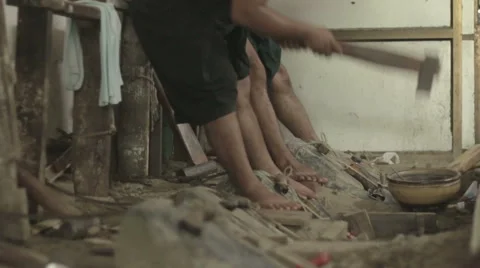 Craftsmen Making Gold Leaf For Buddhist Statues in Mandalay Burma Stock Footage 65856204
