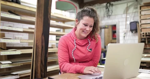 Craftsperson working in snowboard workshop Stock Footage 79658316