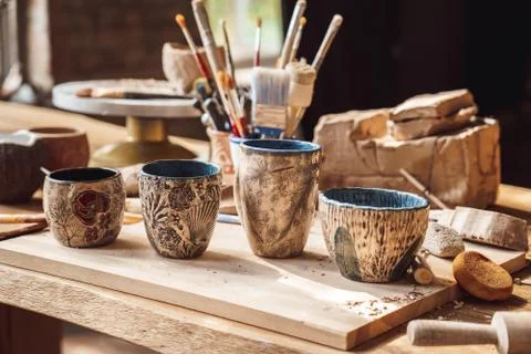 Craftsperson Workspace. Table with materials and tools for pottery isolated Stock Photos