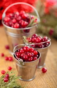 Cranberries in buckets . Stock Photos
