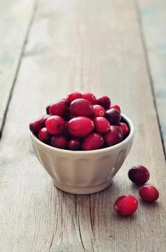 Cranberries in ceramic bowl 写真素材