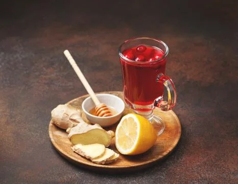 Cranberries lemon ginger drink Stock Photos