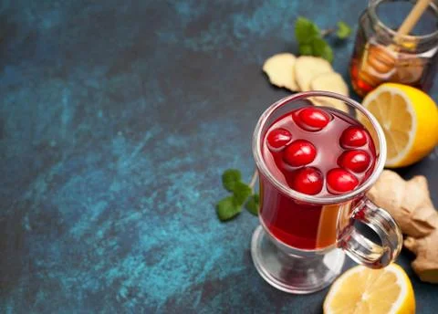Cranberries lemon ginger drink Stock Photos