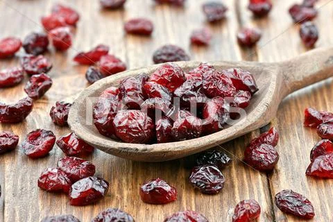 Cranberries On Wooden Spoon