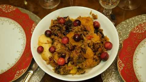 Cranberry and Potatoes served. Dining table Christmas dinner family house. Close Stock-Footage 129046042