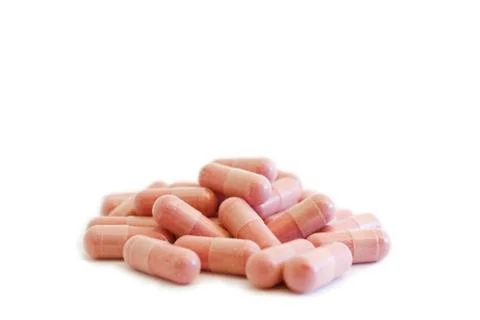 Cranberry capsules Stock Photos