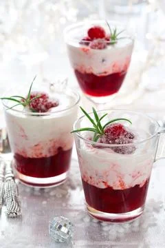 Cranberry dessert with cream Stock Photos