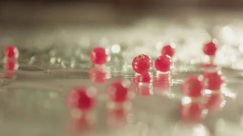 Cranberry fall on glass RAPID 100fps (FEW SHOTS) Stock Footage