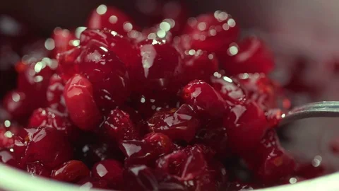 Cranberry jam is mixed with a spoon Stock Footage 121701823
