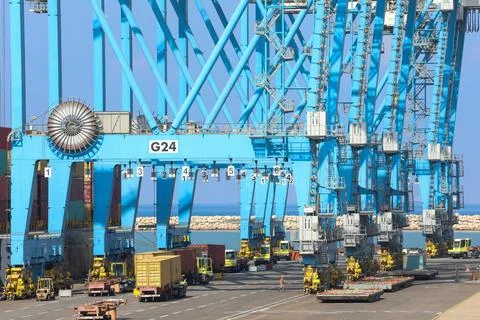 Crane activity in the port. Stock Photos