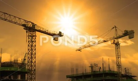 Crane and building construction Stock Photos