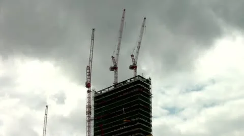 Crane and building construction site against grey sky Stock Footage 22151820