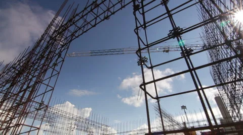 Crane and metal parts at the construction site Stock Footage