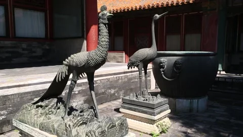 Crane and phoenix statues in the Forbidden City Stock Footage 203121766