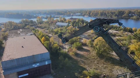 Crane and river. Blue sky. Video stock 163089506
