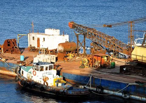 Crane and ship Stock Photos