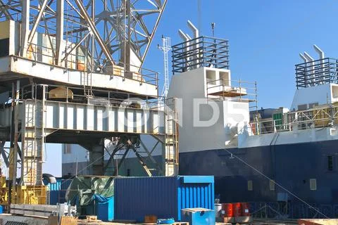 Crane and ship under construction at the shipyard Stock Photos