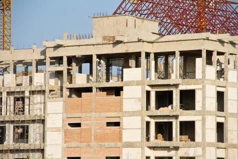 Crane and workers at construction Stock Photos