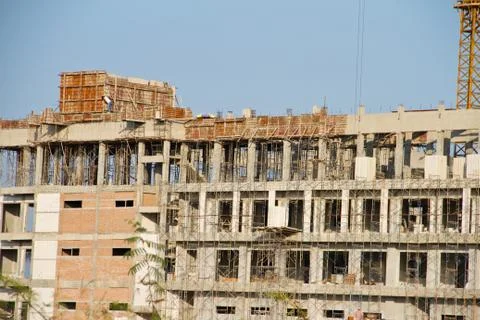 Crane and workers at construction Foto stock
