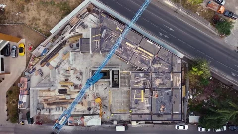 Crane and workers on construction site Stock Footage 168570310