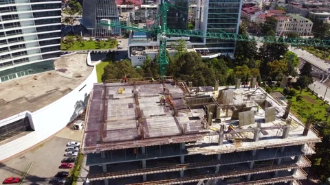 Crane and workers on construction site Stock Footage 168613802