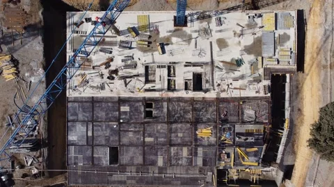 Crane and workers on the construction site Stock Footage 168614107