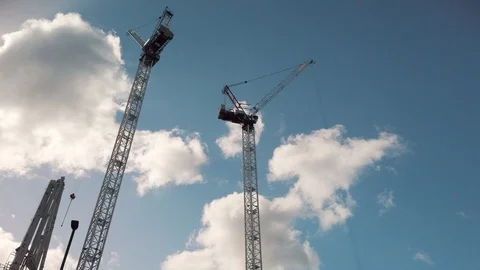 Crane are working on building constraction on blue sky background Stock Footage 115081967