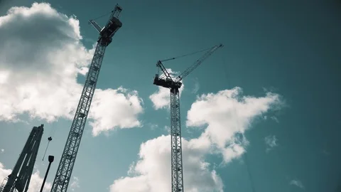 Crane are working on building constraction on blue sky background Stock Footage 115082041